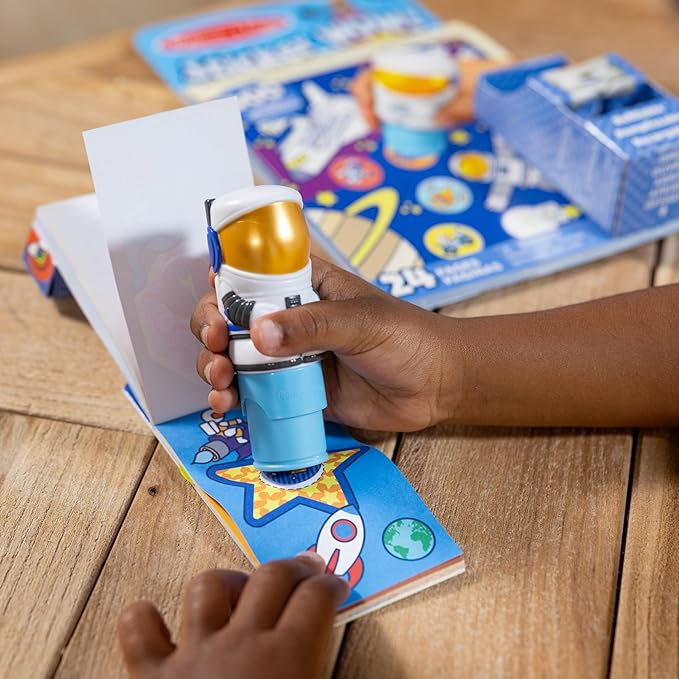 Melissa & Doug Sticker Wow!™ Astronaut Bundle: 24-Page Activity Pad, Sticker Stamper, Mini Activity Pad, 500 Stickers, Arts and Crafts Fidget Toy Collectible Character