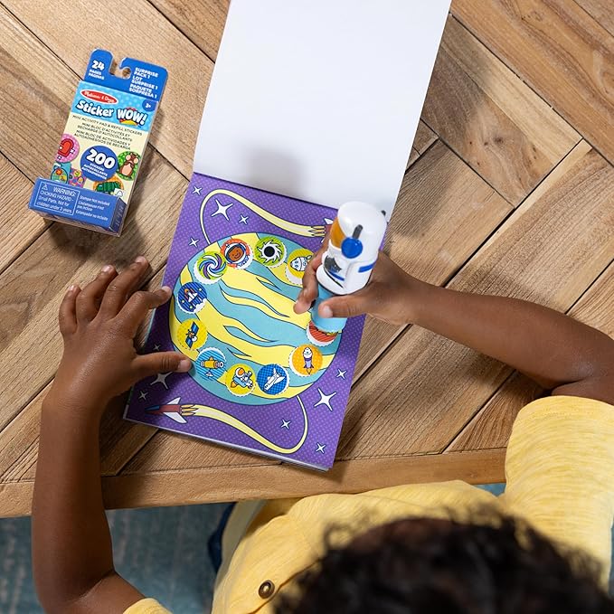 Melissa & Doug Sticker Wow!™ Astronaut Bundle: 24-Page Activity Pad, Sticker Stamper, Mini Activity Pad, 500 Stickers, Arts and Crafts Fidget Toy Collectible Character